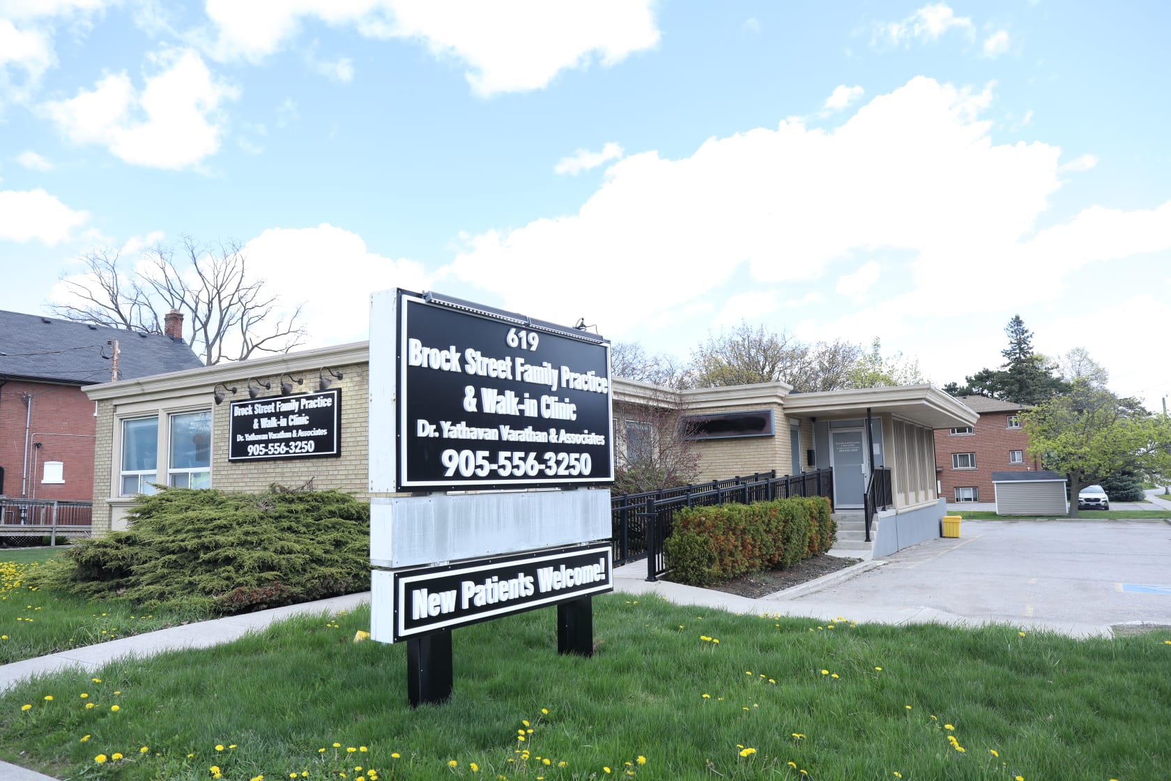 Brock Street Family Practice & Walk-In Clinic signage at 619 Brock Street South